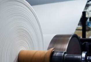 Paper being wound from a press