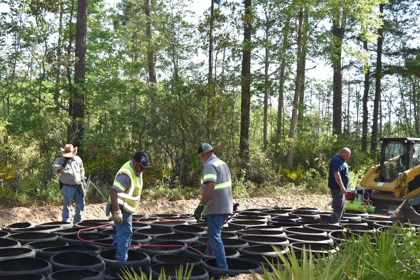 How to fix flooded dirt road with mechanical concrete